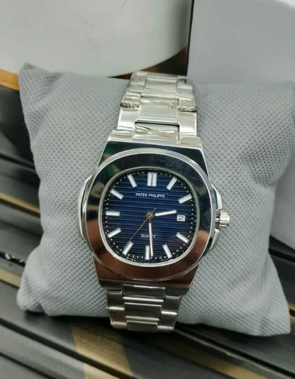 Patek Philippe stainless steel luxury watch with blue dial, date display, and elegant design for men – premium wristwatch
