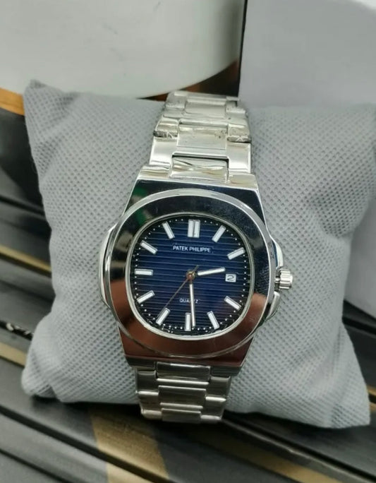 Patek Philippe stainless steel luxury watch with blue dial, date display, and elegant design for men – premium wristwatch