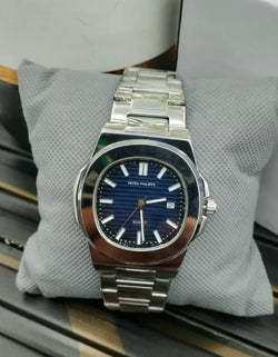 Patek Philippe stainless steel luxury watch with blue dial, date display, and elegant design for men – premium wristwatch